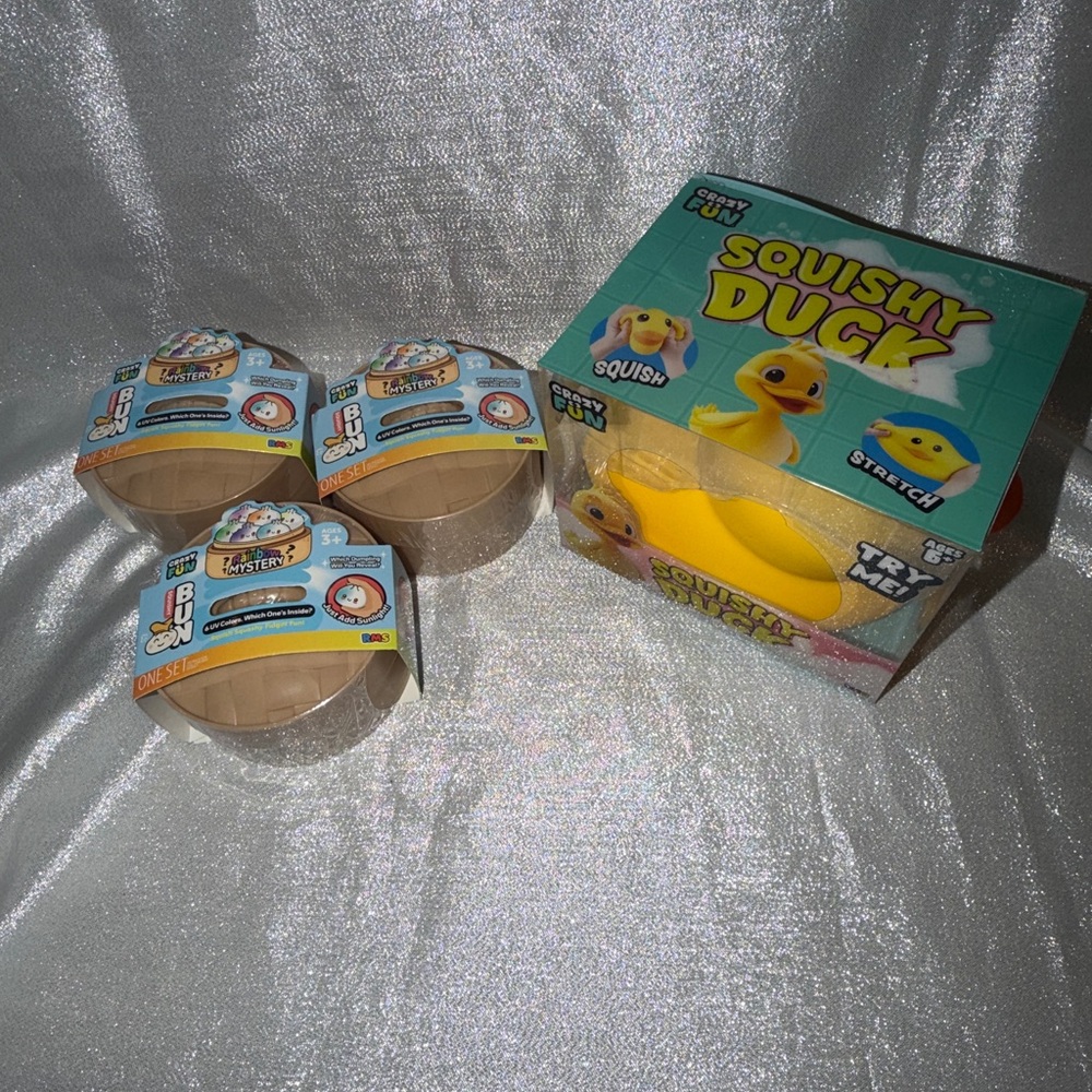 Three (3) UV Series Squishy Dumplings & One (1) Squishy Yellow Duck
